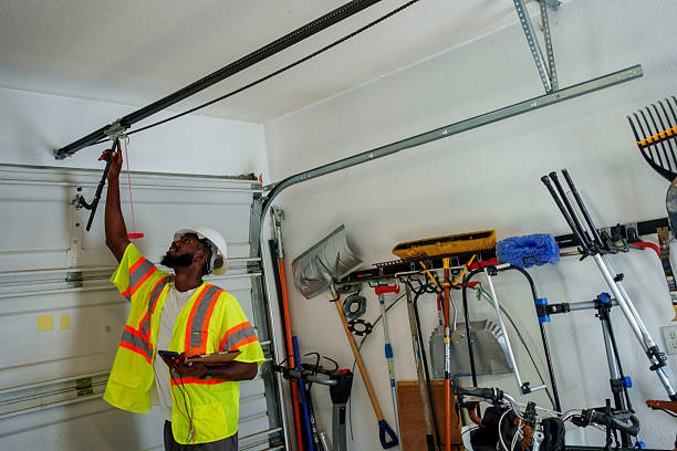 Professional Garage Door Panel Replacement technician working in Port Edwards, WI